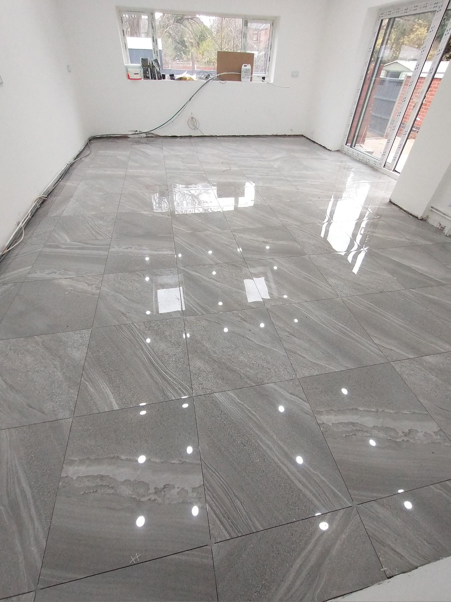Grey polished porcelain floor