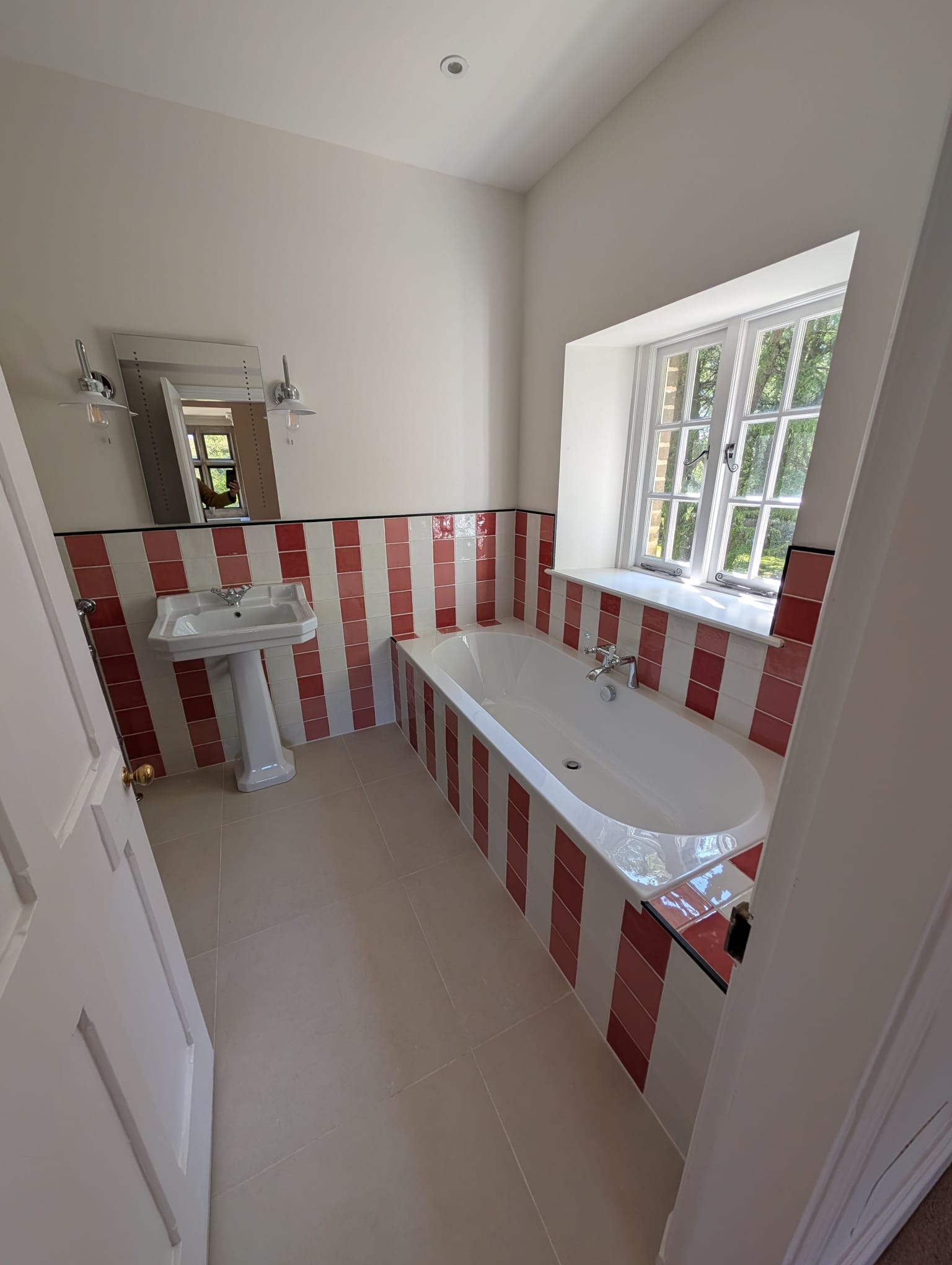 Red and cream stripe traditional bathroom